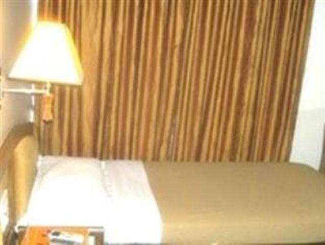 The Ambience Hotel Pune Oda fotoğraf