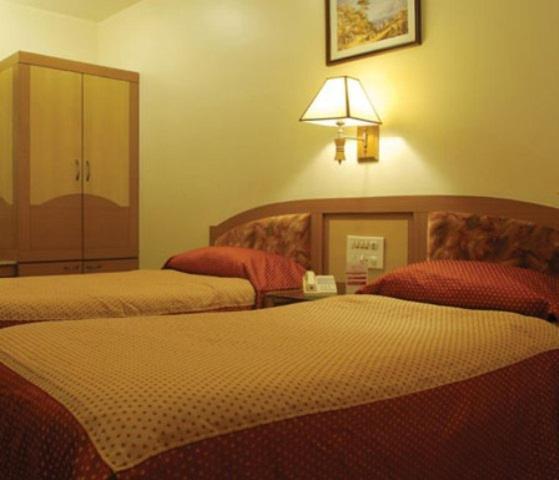 The Ambience Hotel Pune Oda fotoğraf