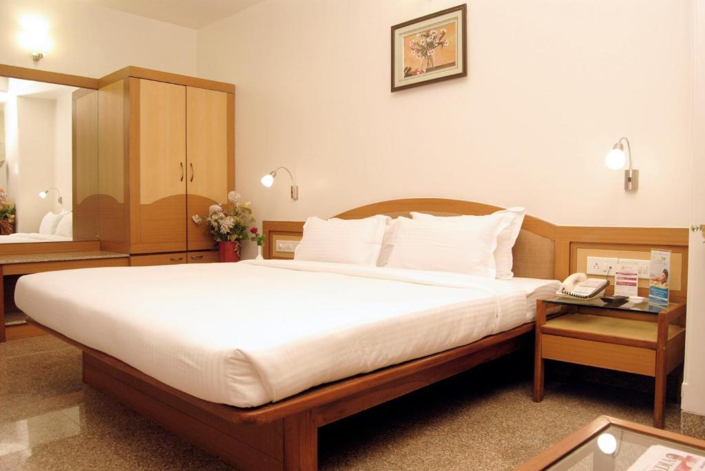 The Ambience Hotel Pune Oda fotoğraf