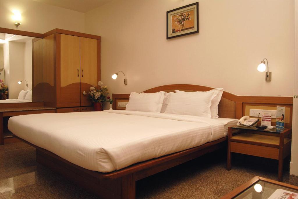 The Ambience Hotel Pune Oda fotoğraf