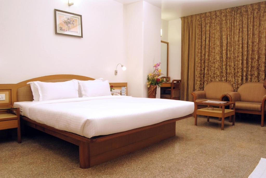 The Ambience Hotel Pune Oda fotoğraf